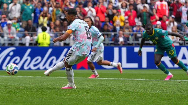 Youri Tielemans scores from the penalty spot to put Belgium ahead against Senegal