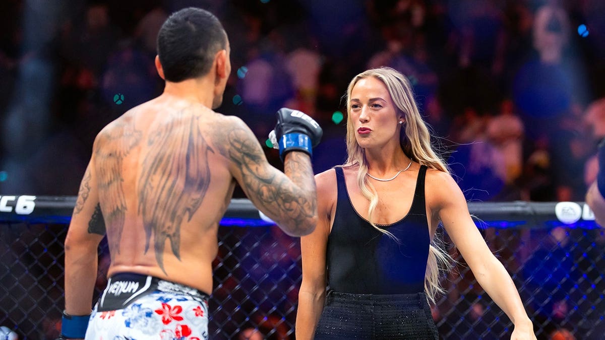 Sophie Cunningham jokes with Max Holloway at T-Mobile Arena.