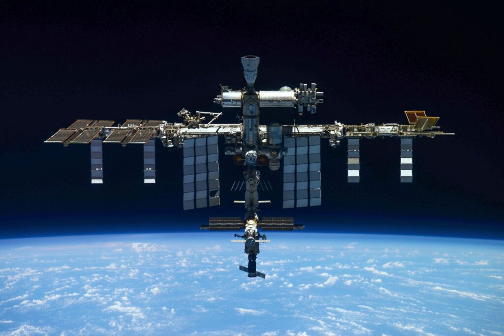A US-Russian space crew lands safely in Kazakhstan after an 8-month stint on the ISS