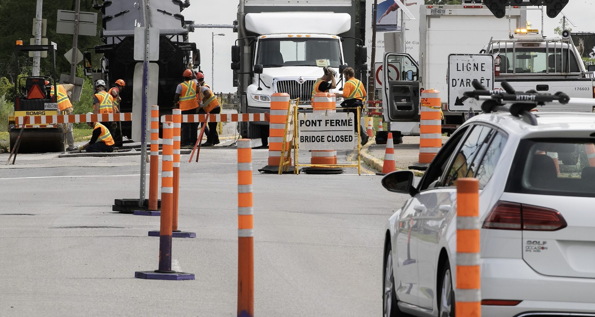 Work crews make emergency repairs on the Montreal side of the Victoria Bridge.