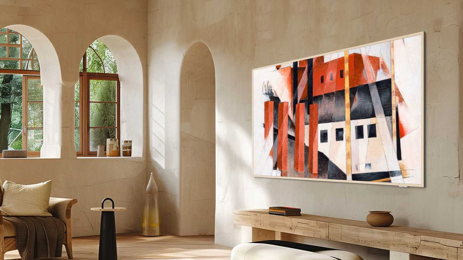 A large TCL NXTVISION TV on a beige wall.