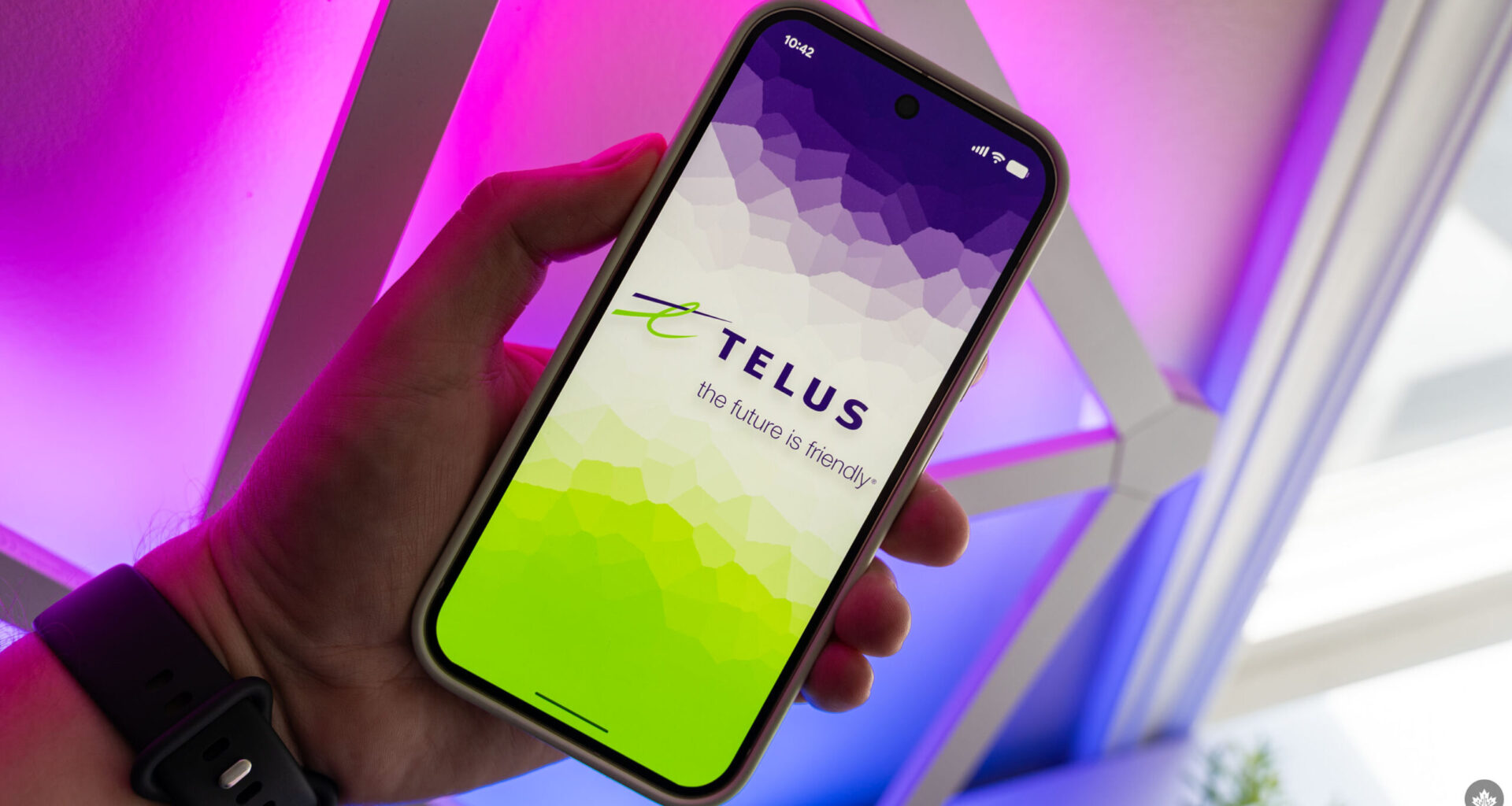 Telus logo on a smartphone