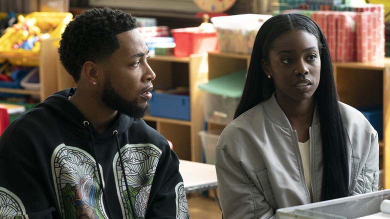 Emmett Washington (Jacob Latimore) glances at Kiesha Williams (Birgundi Baker) in The Chi