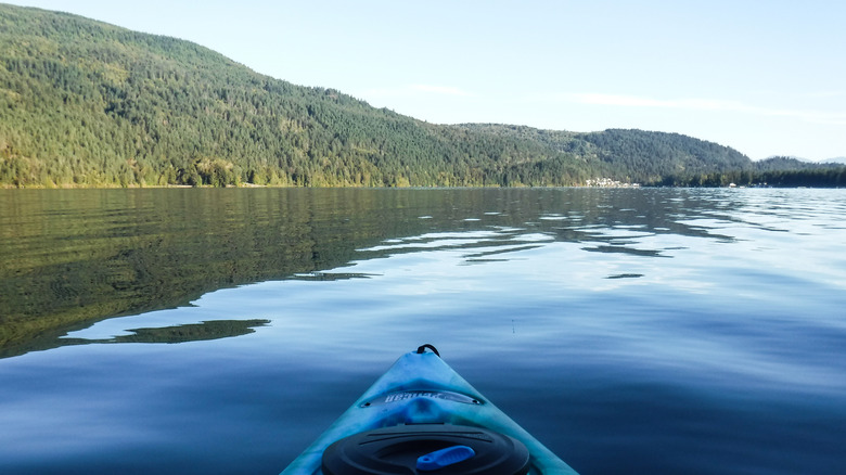 View over the nose of a kayak on Cultus Lake