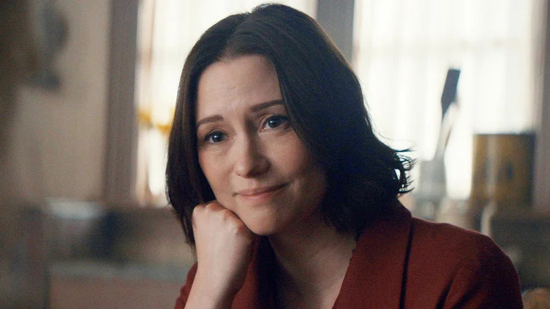 Kat Landry (Chyler Leigh) rests her head on her hand in The Way Home