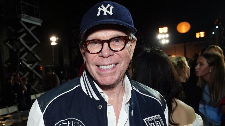 Tommy Hilfiger wearing New York Yankees merch while smiling in Hollywood, California, in 2025.