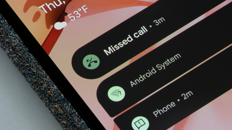 Google Pixel smartphone close up showing missed call alert