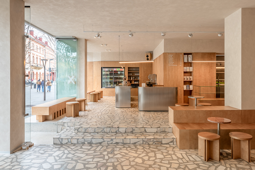 ukyo X blends café, listening bar, and co-working inside restored historic interior in romania - 1