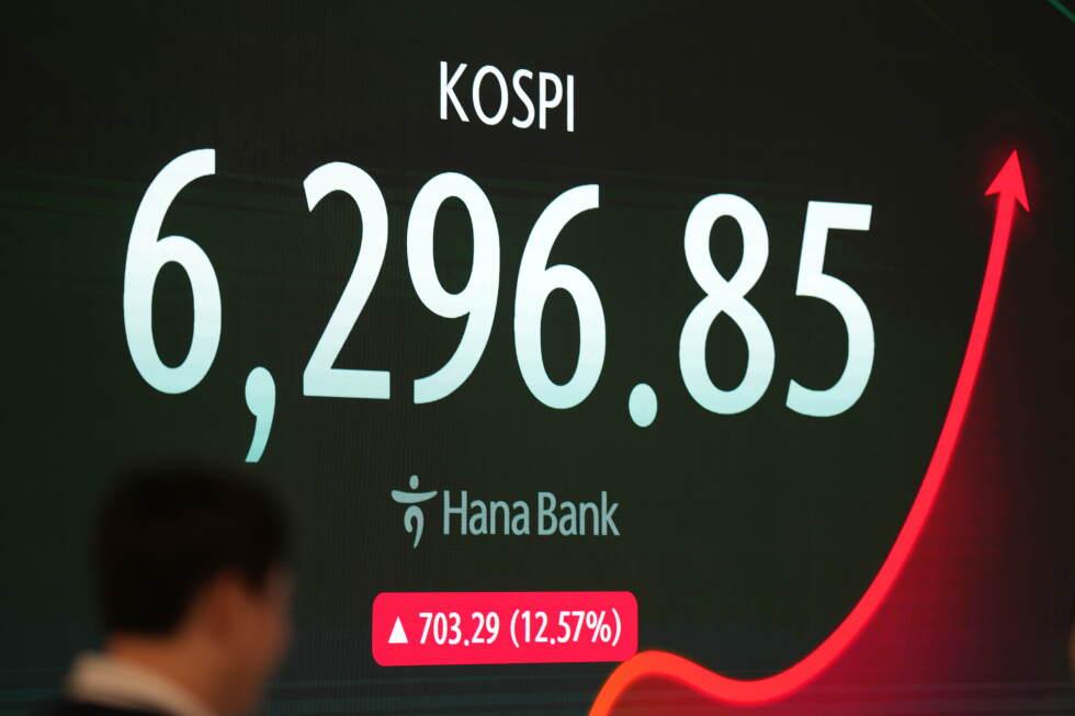 Asian markets rise as AI-related stocks soar