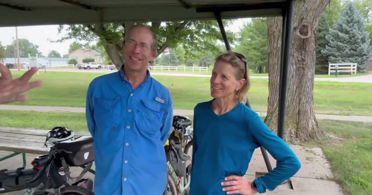 Cycling couple stops in Hooper on their journey across the United States