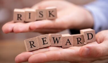 Hands holding blocks spelling risk and reward.