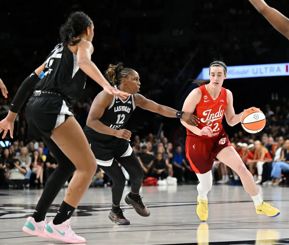 Caitlin Clark 22 of the Indiana Fever dribbles the ball during the game against the Las Vegas Aces