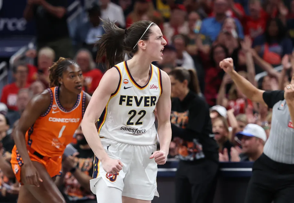 Caitlin Clark 22 of the Indiana Fever celebrates after making a three point basket against the Connecticut Sun at Gainbridge Fieldhouse on July 22, 2026