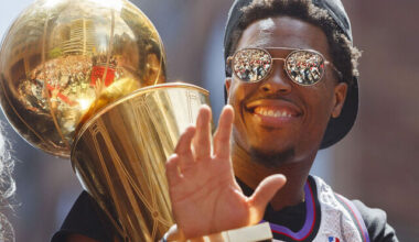 TORONTO, ON - JUNE 17: Kyle Lowry #7 of the Toronto Raptors holds the Larry O'Brien Championship Trophy on the team bus during the Toronto Raptors Championship Victory Parade on June 17, 2019 in Toronto, Ontario. NOTE TO USER: User expressly acknowledges and agrees that, by downloading and/or using this photograph, user is consenting to the terms and conditions of Getty Images License Agreement. Mandatory Copyright Notice: Copyright 2019 NBAE