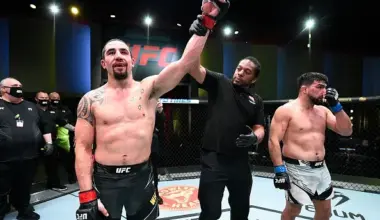 Filipino MMA fighter Joshua Pacio celebrates a win with his team
