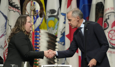 Prime Minister Mark Carney shakes hands with AFN National Chief Cindy Woodhouse Nepinak following his speech at the Assembly of First Nations Special Chiefs Assembly in Ottawa on Tuesday, Dec. 2, 2025.