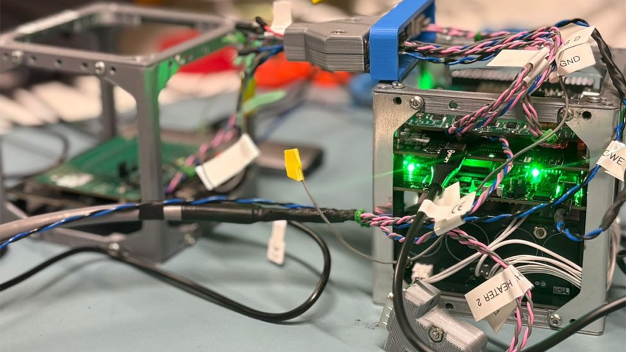 a bundle of wiring inside a metal frame