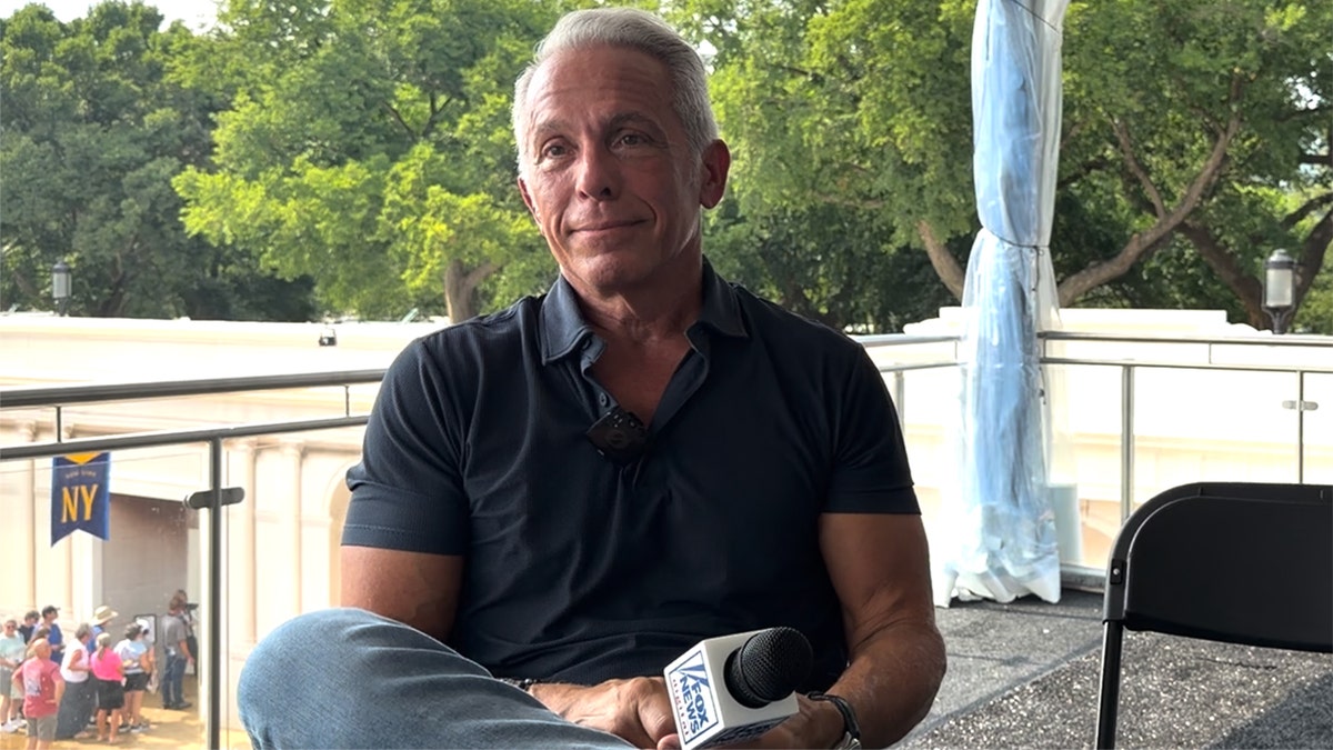 Geoffrey Zakarian holding a Fox News Digital microphone.
