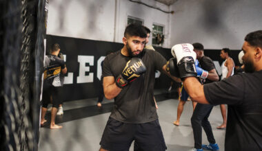 Muhammed Eesa, wearing Venum-branded boxing gloves, sparring during a training session at Legends MMA and Fitness Centre, Luton