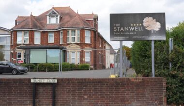 Support staff worker stabbed at Surrey hotel used to house asylum seekers, MP says
