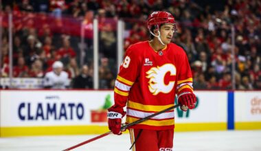 Apr 16, 2026; Calgary, Alberta, CAN; Calgary Flames defenseman Zayne Parekh (19) against the Los Angeles Kings during the second period at Scotiabank Saddledome. Mandatory Credit: Sergei Belski-Imagn Images