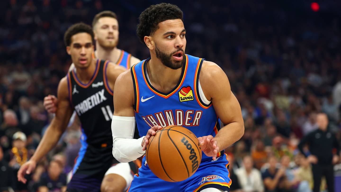 Apr 27, 2026; Phoenix, Arizona, USA; Oklahoma City Thunder guard Ajay Mitchell (25) against the Phoenix Suns during game four of the first round of the 2026 NBA Playoffs at Mortgage Matchup Center. Mandatory Credit: Mark J. Rebilas-Imagn Images