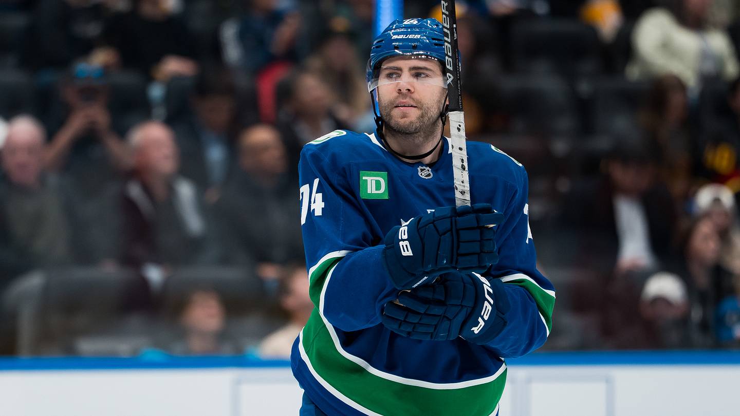 Mar 24, 2026; Vancouver, British Columbia, CAN; Vancouver Canucks forward Jake DeBrusk (74) during a stop in play against the Anaheim Ducks in the second period at Rogers Arena. Mandatory Credit: Bob Frid-Imagn Images