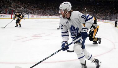 Dec 7, 2024; Pittsburgh, Pennsylvania, USA;  Toronto Maple Leafs left wing Alex Nylander (92) moves the puck against the Pittsburgh Penguins during the first period at PPG Paints Arena. Mandatory Credit: Charles LeClaire-Imagn Images