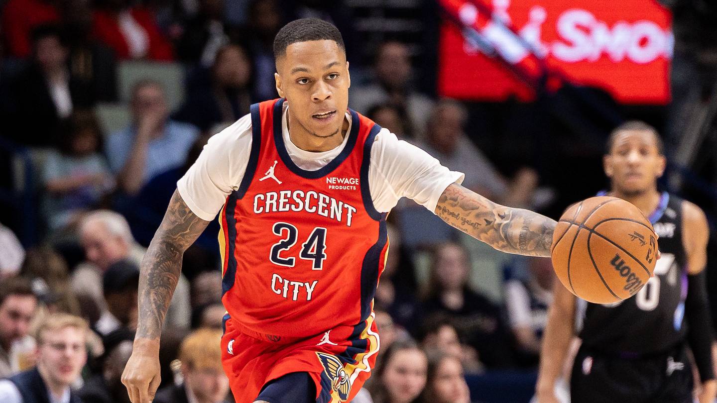 Apr 7, 2026; New Orleans, Louisiana, USA;  New Orleans Pelicans guard Jordan Hawkins (24) dribbles the ball court against the Utah Jazz during the first half at Smoothie King Center. Mandatory Credit: Stephen Lew-Imagn Images