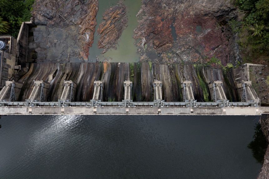 Low water levels are seen downstream from the Carraizo Dam in Trujillo Alto, Puerto Rico, on August 11.