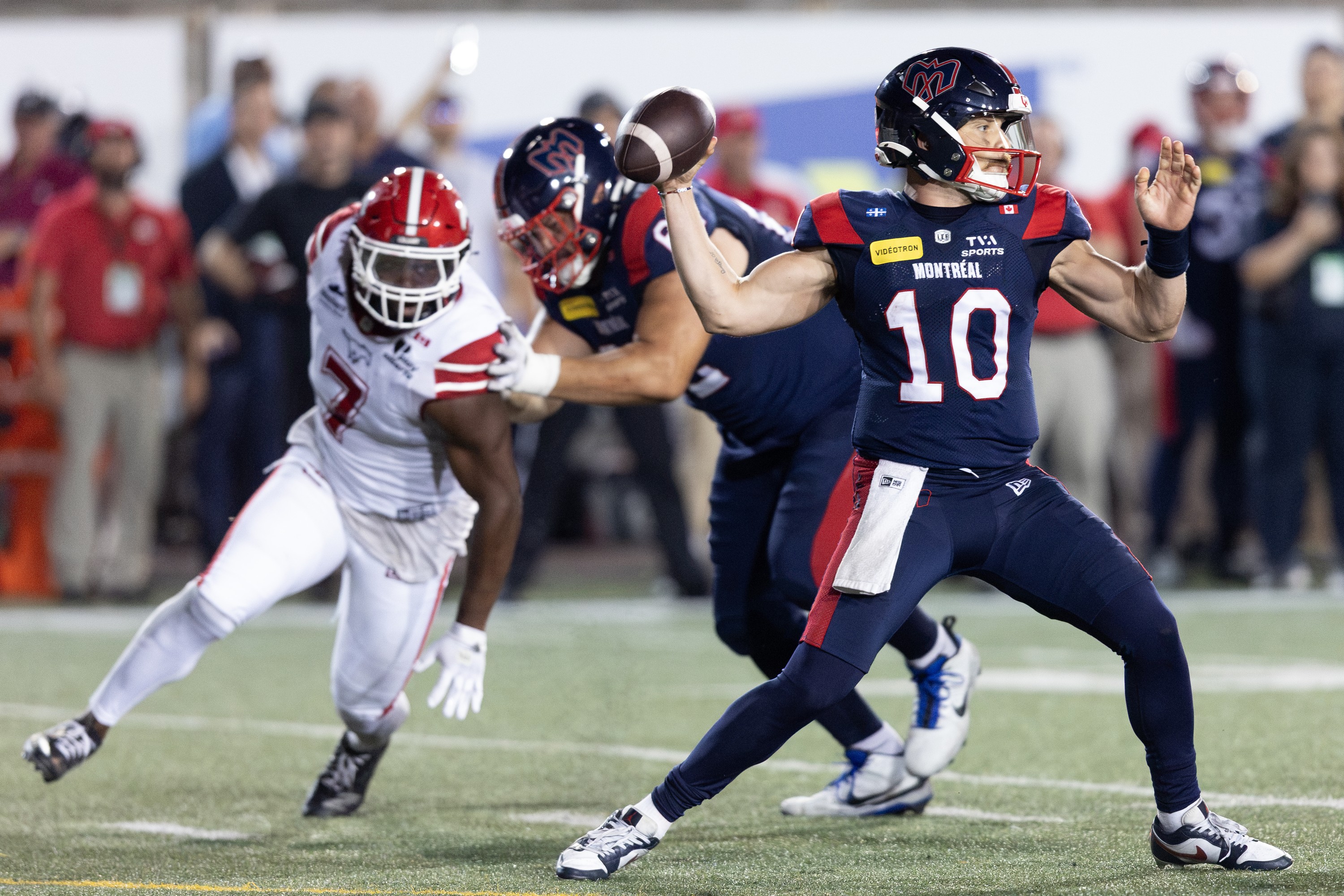 Alouettes quarterback Davis Alexander cocks his right arm back as he attempts a pass during the fourth quarter Saturday night.