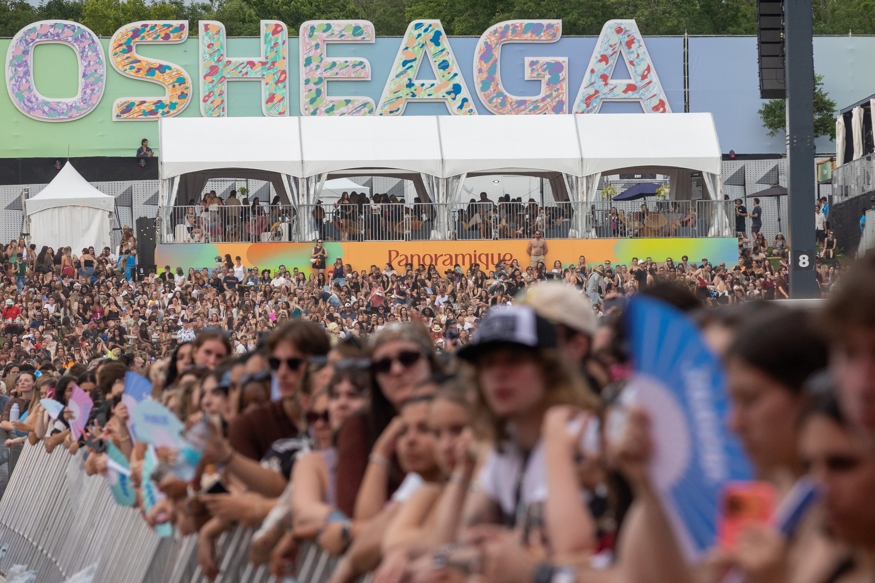 Festivalgoers watch Malcolm Todd's set at the Osheaga Music and Arts Festival