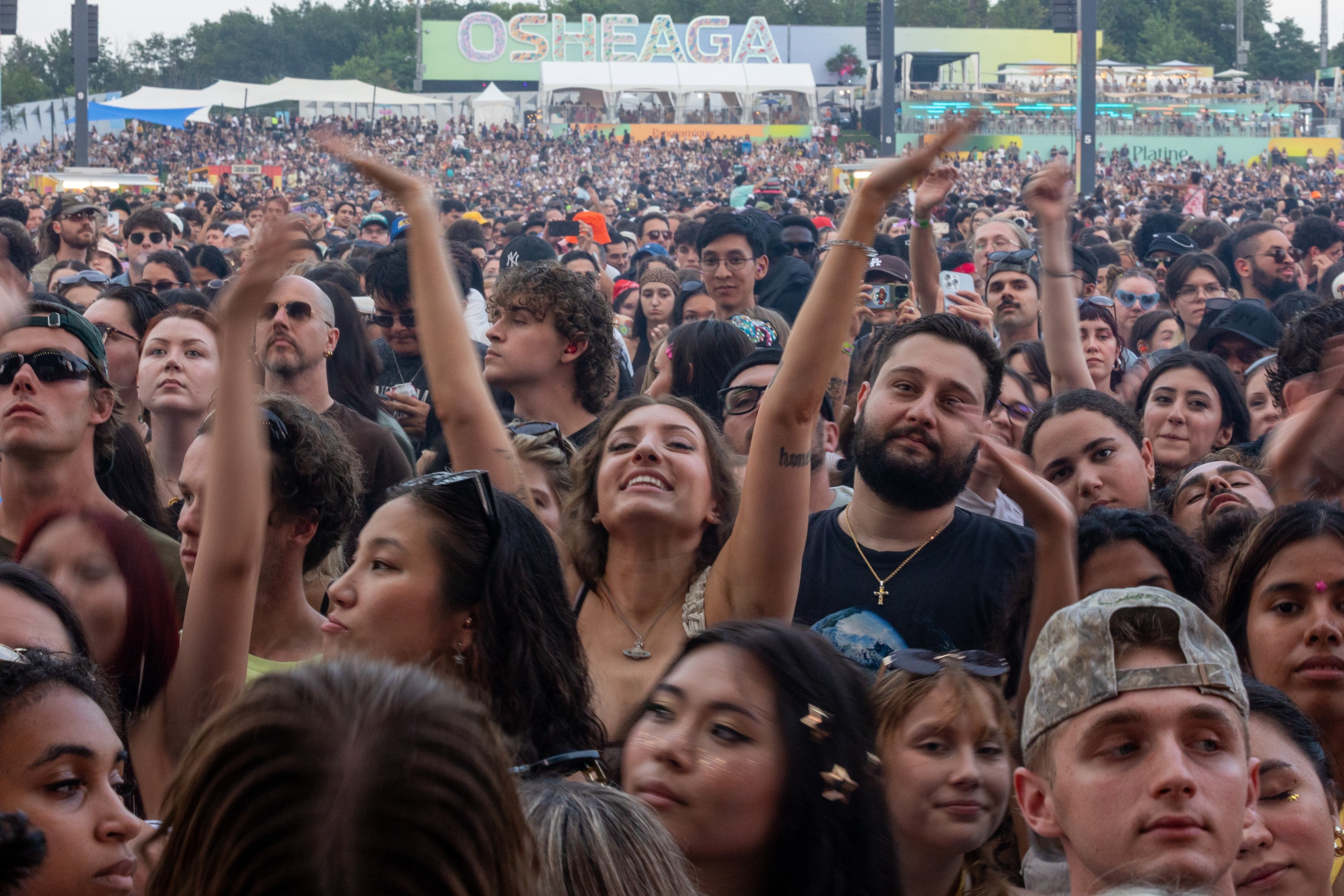 Festivalgoers watch the xx perform at the Osheaga Music and Arts Festival