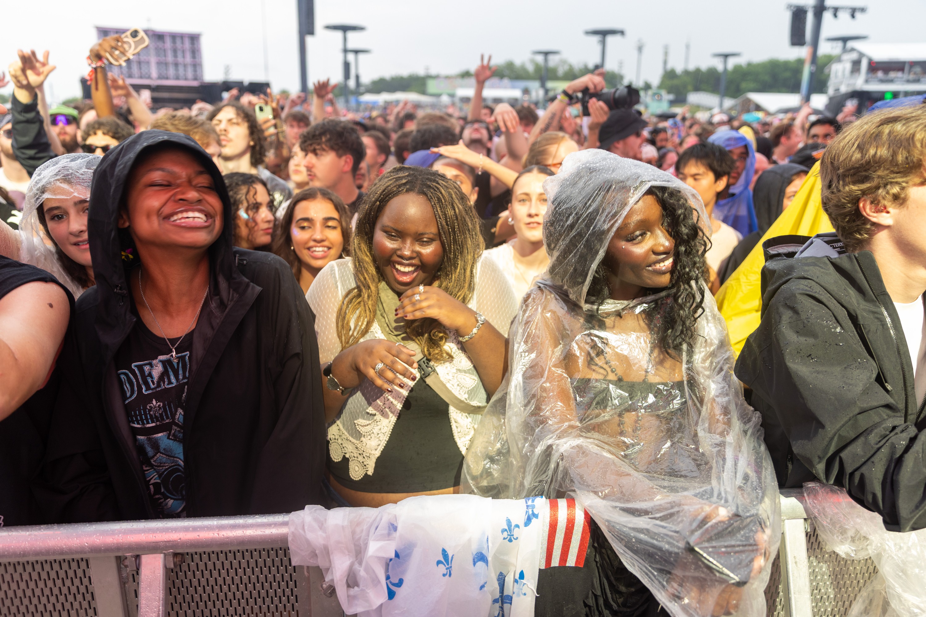 Fans of Clipse dance during the hip-hop duo's performance at the Osheaga Music and Arts Festival
