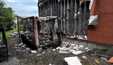 The side of a damaged building after a fire