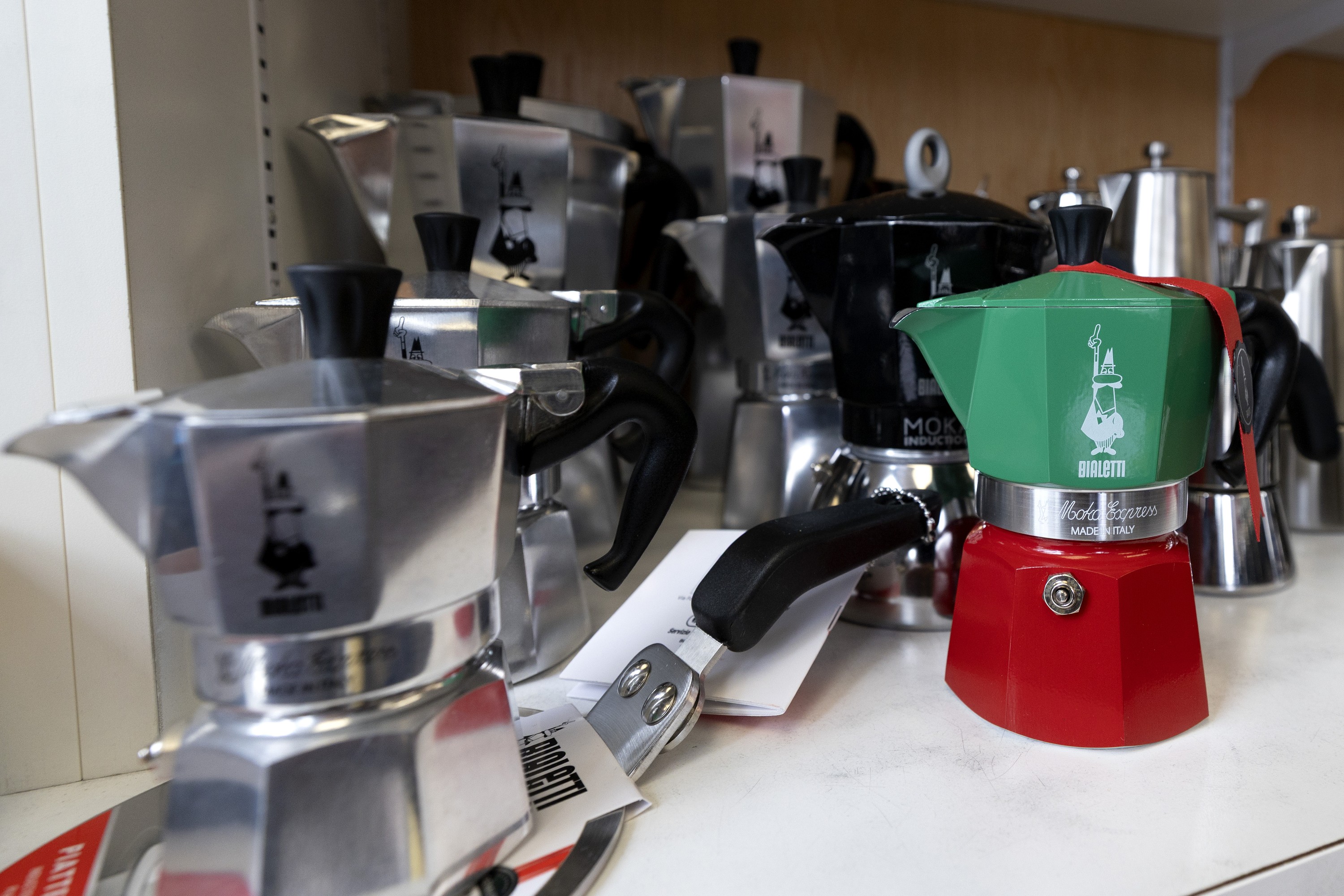 Bialetti cofee-makers, one in the red and green colours of Italy's flag, sold at Quincaillerie Dante.