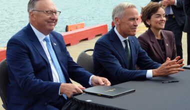 Newfoundland and Labrador Premier Tony Wakeham, Prime Minister Mark Carney and Quebec Premier Christine Fréchette take part in a signing ceremony