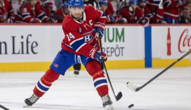 Montreal Canadiens' Nick Suzuki passes the puck during third period of National Hockey League game against the New York Islanders in Montreal Thursday February 26, 2026.
