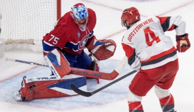 Canadiens' Jakub Dobes makes a pad save on Carolina Hurricanes' Shayne Gostisbehere during Game 3 in Montreal on May 25.