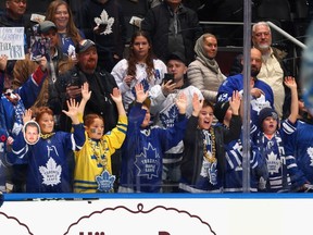 Fans watch warm-ups prior to the game between the Toronto Maple Leafs and the Boston Bruins at Scotiabank Arena last season.