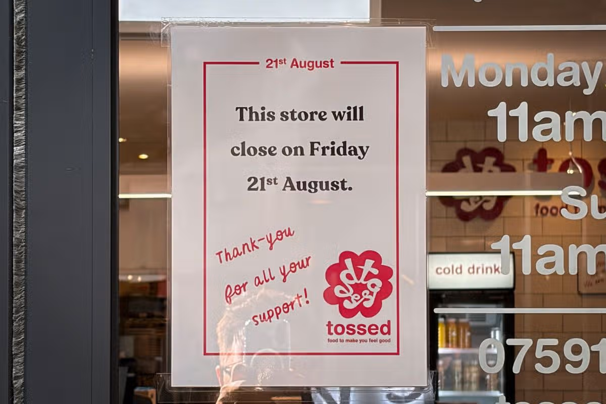 The sign in the window of Tossed in Nottingham