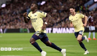 Bukayo Saka runs off in celebration of his goal, followed by Declan Rice
