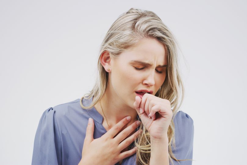 Woman coughing