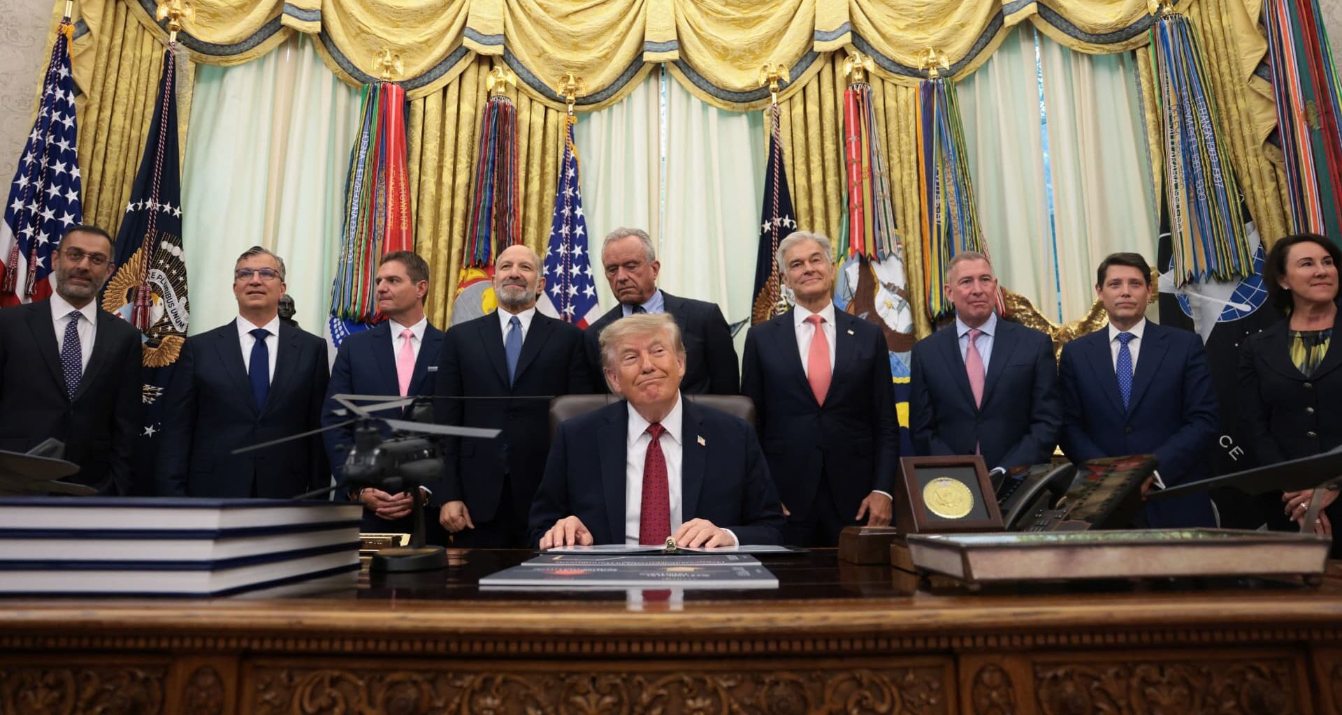Trump strikes new drug pricing deals with nine midsized drugmakers