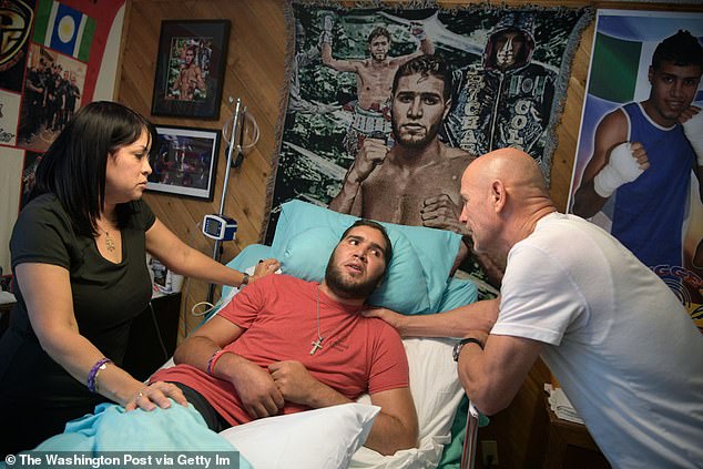 He was left in a vegetative state and was under the near-constant care of his family