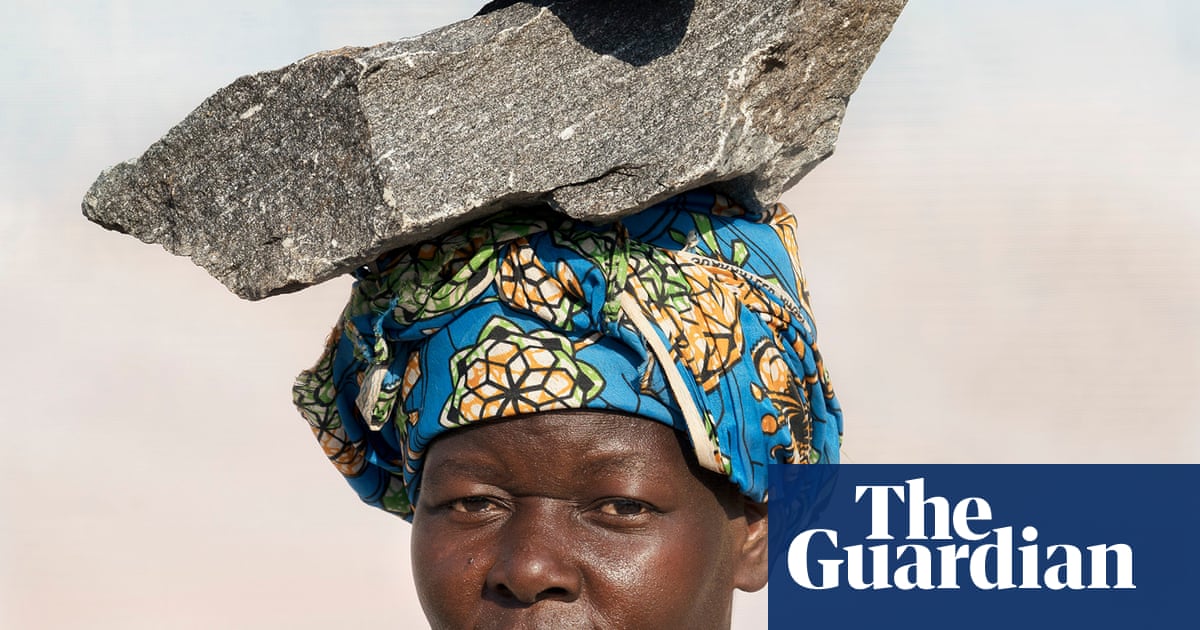 A Ugandan quarry worker carrying rocks on her head: Dan Nelken’s best photograph | Art and design