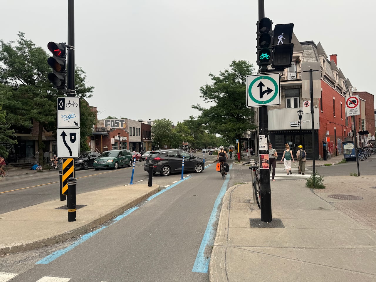 A car turning across a bike lane.