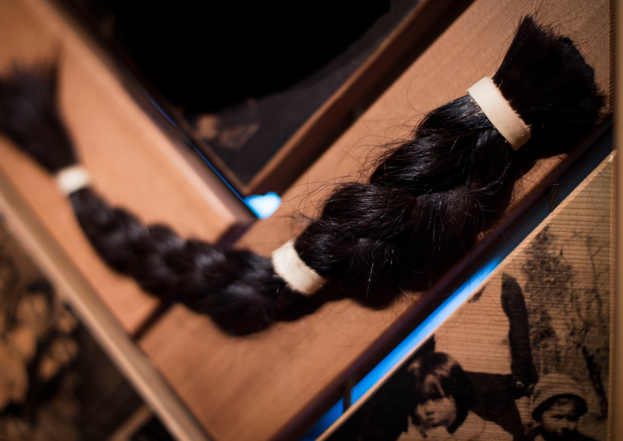 A braid of dark hair.