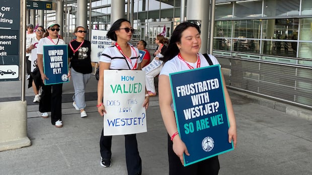 WestJet flight attendants hit picket lines in Winnipeg as strike takes off