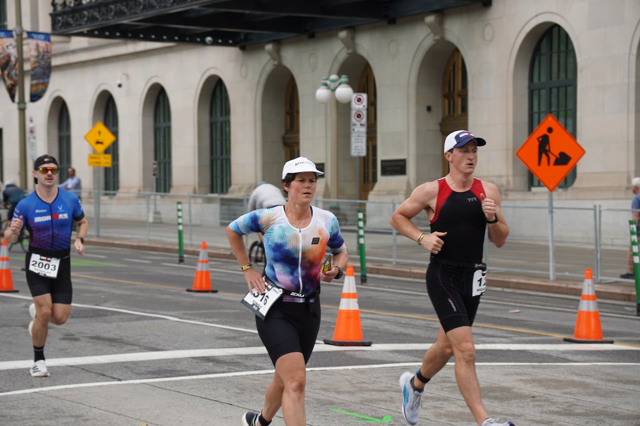 After an 180-kilometre bike ride, racers embark on a full marathon by foot, dashing down Wellington Street and through the downtown core.